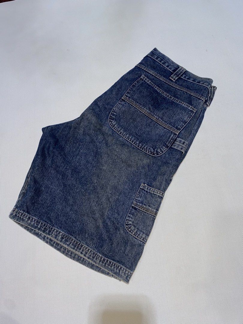 Vintage denim cargo shorts size 36 (Category: Shorts) located in Tagum. Submitted by waaap420 (Listing ID 1470963079, Image 2). Description: - Style: Blue denim cargo shorts with utility pockets - Size: 36 - Material: 100% cotton - Finish: Washed blue with natural fading and distressing - Closure: Button fly - Condition/Use: Practical for daily wear.