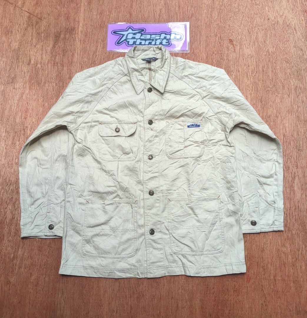 Vintage Eddie Bauer Utility work wear jacket dated July 2000 (Category: Coats, Jackets and Outerwear) located in Kapalong. Submitted by hashhthrift (Listing ID 1470952035, Image 1). Description: dated July 2000 no issue excellent condition color rate 9.9/10 color biege featuring multi pocket with 100% cotton.