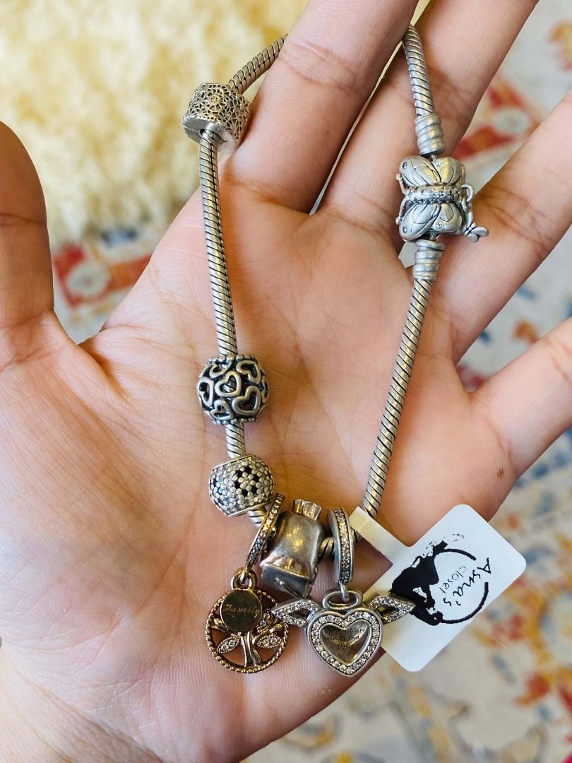 Vintage Pandora with Charms Silver Bangle (Category: Bracelets) located in Baguio. Submitted by asna_taku (Listing ID 1471013433, Image 2). Description: Vintage Pandora with Charms Silver Bangle 33g 18.5CM ₱13580.