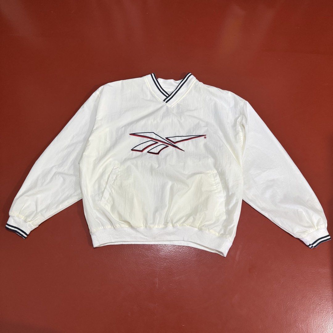 VINTAGE REEBOK WINDBREAKER (Category: Coats, Jackets and Outerwear) located in Pasig City. Submitted by buzzthrifty (Listing ID 1471000891, Image 2). Description: SIZE L-XL 24-25x27 EXCELLENT CONDITION CUT LANG TAGS .