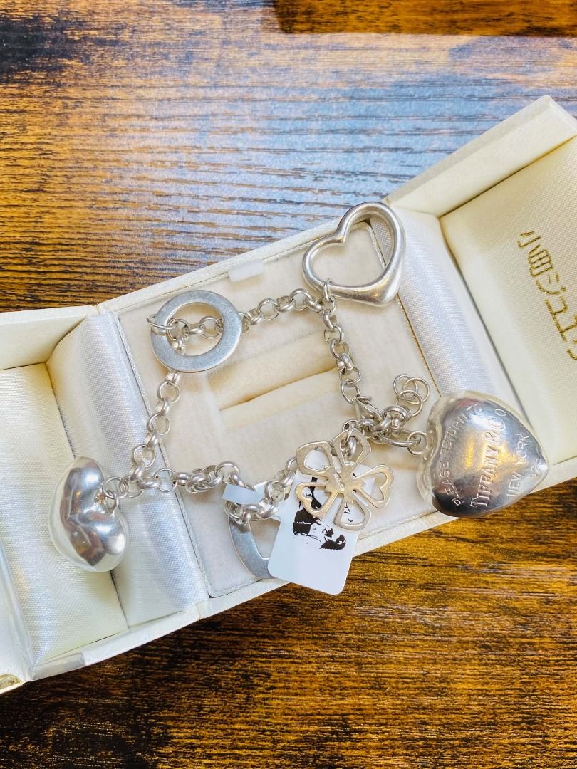 Vintage Tiffany & Co Charm Silver Bracelet (Category: Bracelets) located in Baguio. Submitted by asna_taku (Listing ID 1471011633, Image 1). Description: Vintage Tiffany & Co Charm Silver Bracelet 28.5g Adjustable up to 19CM ₱11280.