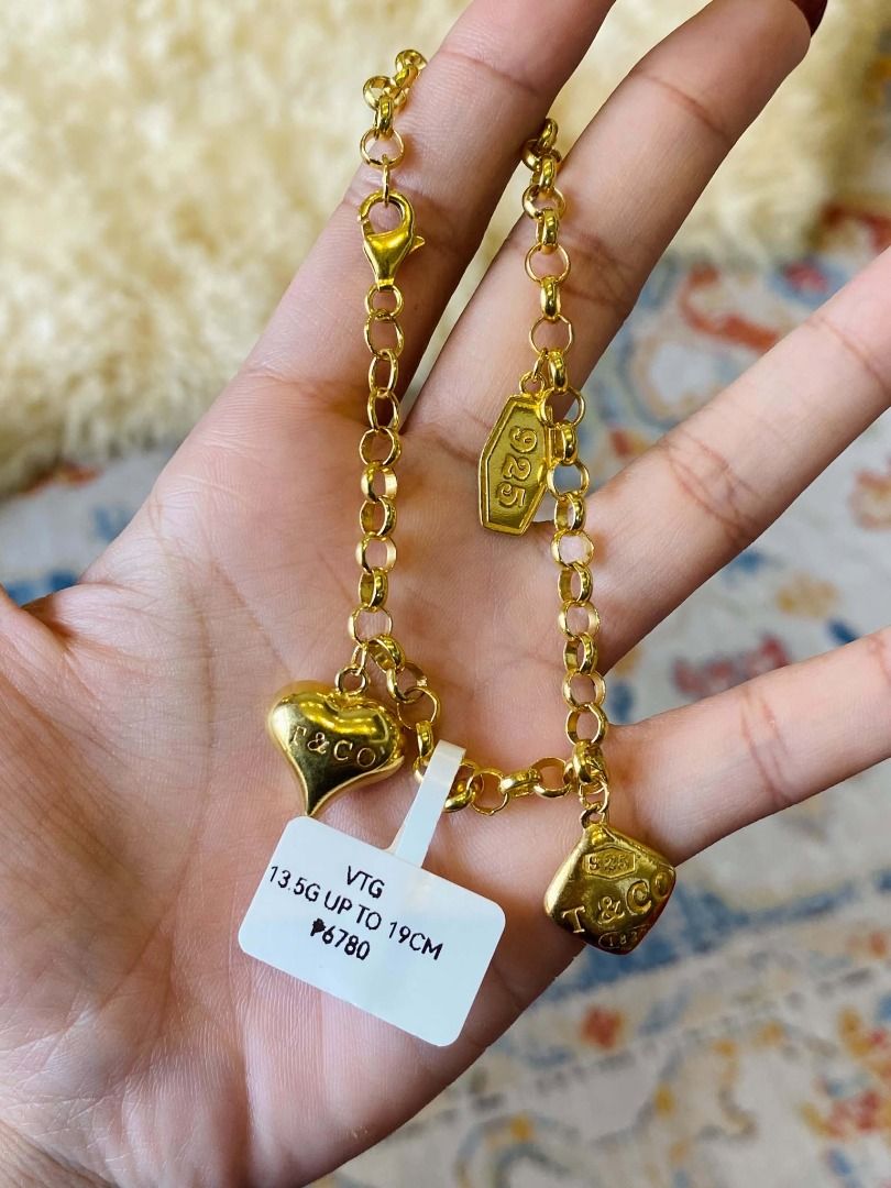 Vintage Tiffany & Co Silver Charm Bracelet (Category: Bracelets) located in Baguio. Submitted by asna_taku (Listing ID 1471013786, Image 2). Description: Vintage Tiffany & Co Silver Charm Bracelet Plated in Gold 13.5g Adjustable up to 19CM ₱6780.