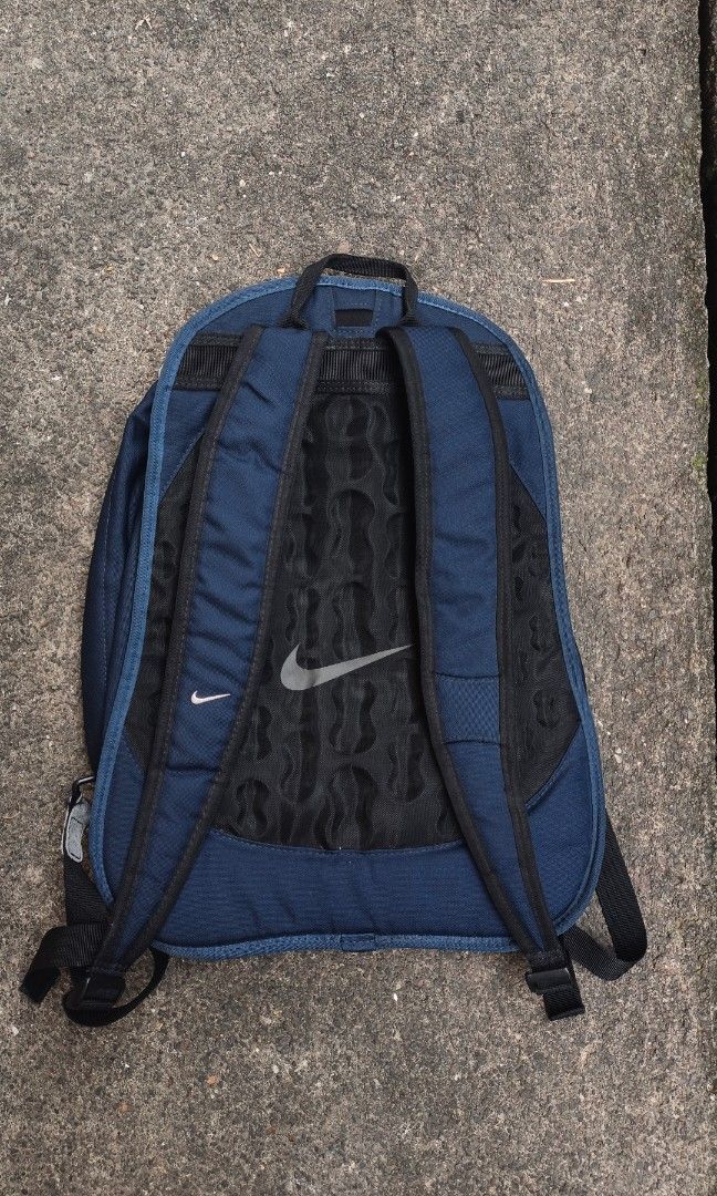 Vintage Y2K Nike Cordura Backpack (Category: Backpacks) located in Canlaon. Submitted by thriftytrift (Listing ID 1471043136, Image 2). Description: ✔️ Authentic Nike, Cordura fabric (tag inside) ✔️ Embroidered swoosh on front, printed swoosh on mesh back panel ✔️ Multiple zip compartments plus side zip pocket ✔️ Padded mesh back and adjustable straps ✔️ Top carry handle No issue Excellent condition Pwede Vc para makita mo.