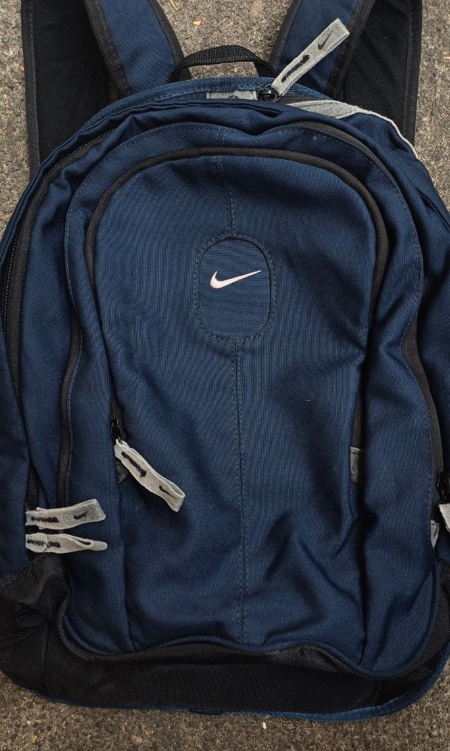 Vintage Y2K Nike Cordura Backpack (Category: Backpacks) located in Canlaon. Submitted by thriftytrift (Listing ID 1471043136, Image 3). Description: ✔️ Authentic Nike, Cordura fabric (tag inside) ✔️ Embroidered swoosh on front, printed swoosh on mesh back panel ✔️ Multiple zip compartments plus side zip pocket ✔️ Padded mesh back and adjustable straps ✔️ Top carry handle No issue Excellent condition Pwede Vc para makita mo.