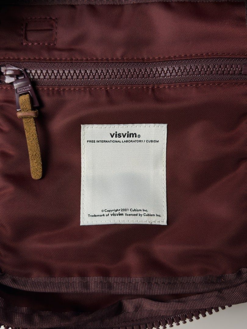 Visvim Ballistic Lumbar 8L Bag (Category: Belt bags, Clutches and Pouches) located in Manila. Submitted by streetsavvy (Listing ID 1471039439, Image 3). Description: Visvim Ballistic Lumbar 8L Bag Width: 14” Height: 11” Depth: 4.5” Strap Drop: 15” (adjustable Strap Measured in Inches VISVIM Ballistic Lumbar 8L bag in the sought-after Burgundy/Wine colorway featuring a heavy premium suede base. Designed with unmatched utility and craftsmanship, th