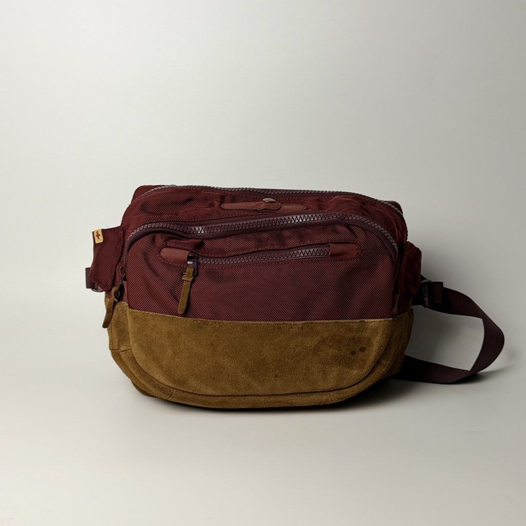 Visvim Ballistic Lumbar 8L Bag (Category: Belt bags, Clutches and Pouches) located in Manila. Submitted by streetsavvy (Listing ID 1471039439, Image 1). Description: Visvim Ballistic Lumbar 8L Bag Width: 14” Height: 11” Depth: 4.5” Strap Drop: 15” (adjustable Strap Measured in Inches VISVIM Ballistic Lumbar 8L bag in the sought-after Burgundy/Wine colorway featuring a heavy premium suede base. Designed with unmatched utility and craftsmanship, th