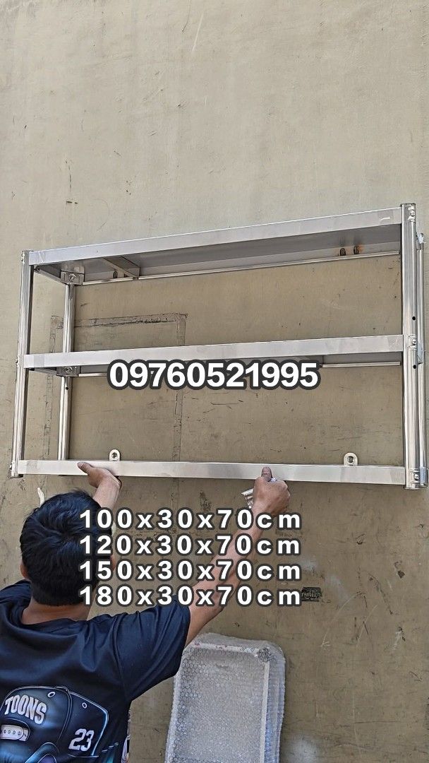 Wall Hanging Shelves 3 Layer Stainless Steel (Category: Shelves, Cabinets & Racks) located in Manila. Submitted by acykt18 (Listing ID 1471082386, Image 3). Description: - Heavy-duty 3-tier stainless steel wall hanging shelf - Ideal for kitchen, restaurant, or garage organization - Available lengths: 100cm, 120cm, 150cm, and 180cm - Dimensions: 30cm depth x 70cm height - Sturdy metal construction resists rust and holds heavy items securely - Easy