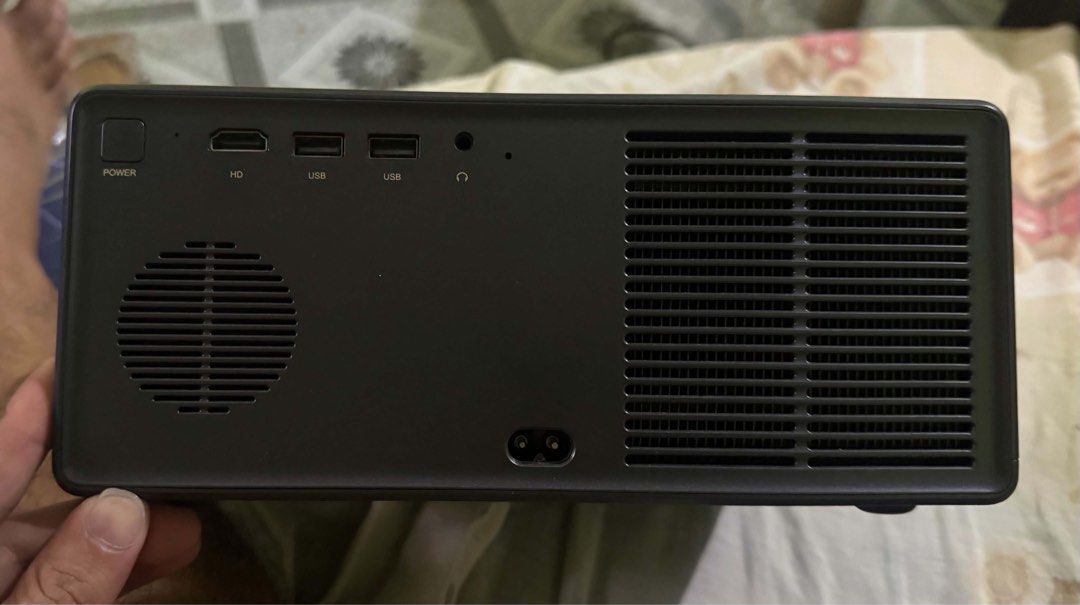 Wanbo X5 Pro Smart Projector Full HD 1080p (Category: Projectors) located in San Jose del Monte. Submitted by denielargelo (Listing ID 1471021371, Image 2). Description: - Model: Wanbo X5 Pro Smart Projector (Dark Grey) - Resolution: Native 1080p Full HD with HDR10 support - Brightness: 1100 ANSI lumens for bright, clear viewing - Smart Features: ASA 3.0 auto focus and auto keystone correction - Connectivity: Built-in Wi-Fi and Bluetooth - Ports: