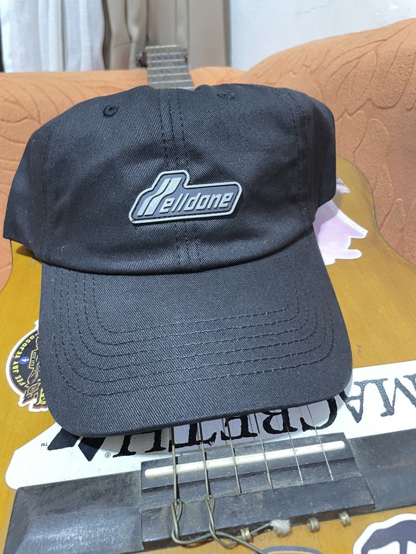 We11done Black Baseball Cap with Logo Patch (Category: Caps & Hats) located in Manila. Submitted by clementdav22513 (Listing ID 1471025682, Image 1). Description: - Brand: We11done - Color: Classic Black - Material: Clean, durable cotton with a smooth satin lining - Details: Rubberized logo patch on front, interior name tag patch, and adjustable metal buckle stamped with the brand name - Condition: Great everyday hat, excellent quality - Shipping