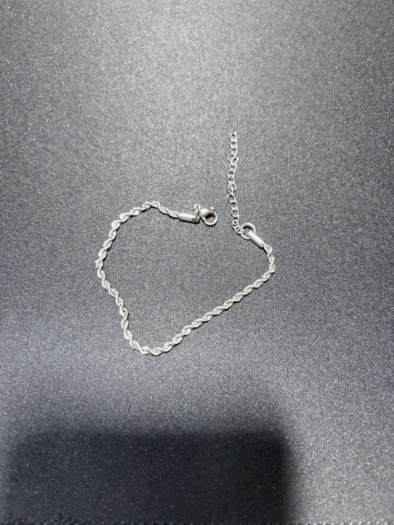 We The Present Rope Chain Thin Bracelet BA00033 (Category: Jewelry) located in Mandaluyong City. Submitted by juliansthings (Listing ID 1471089673, Image 3). Description: - Brand: We The Present - Model: BA00033 - Style: Thin rope chain bracelet in silver tone - Closure: Adjustable chain length with lobster clasp - Inclusions: Original blue presentation box and packaging pouch - Condition: Brand new, never worn, pristine condition - Material: Hyp