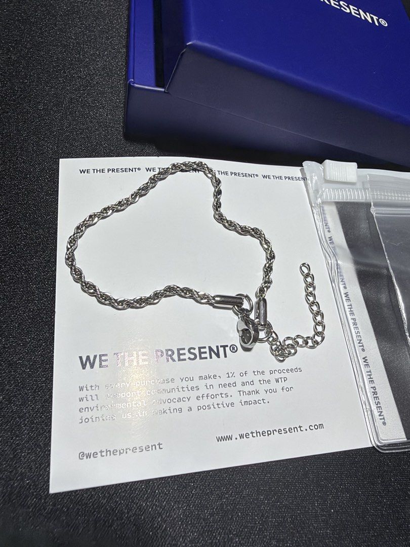 We The Present Rope Chain Thin Bracelet BA00033 (Category: Jewelry) located in Mandaluyong City. Submitted by juliansthings (Listing ID 1471089673, Image 2). Description: - Brand: We The Present - Model: BA00033 - Style: Thin rope chain bracelet in silver tone - Closure: Adjustable chain length with lobster clasp - Inclusions: Original blue presentation box and packaging pouch - Condition: Brand new, never worn, pristine condition - Material: Hyp