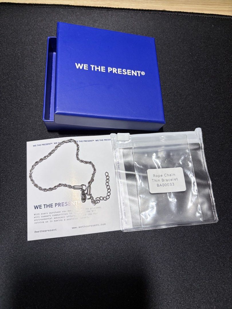 We The Present Rope Chain Thin Bracelet BA00033 (Category: Jewelry) located in Mandaluyong City. Submitted by juliansthings (Listing ID 1471089673, Image 1). Description: - Brand: We The Present - Model: BA00033 - Style: Thin rope chain bracelet in silver tone - Closure: Adjustable chain length with lobster clasp - Inclusions: Original blue presentation box and packaging pouch - Condition: Brand new, never worn, pristine condition - Material: Hyp
