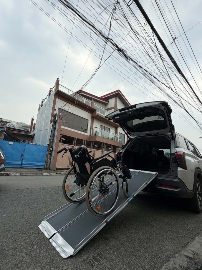 Wheelchair scooter ramp (Category: Construction & Building Materials) located in Manila. Submitted by calmdolphin.87b0e4 (Listing ID 1470959496, Image 3). Description: 🦽 Foldable Wheelchair Ramp — Description ✅ Product Details: • Material: Lightweight but heavy-duty aluminum frame ✨ • Design: Foldable / split-type — naghahati sa dalawa para madaling bitbitin at itago • Surface: Non-slip textured surface — ligtas at hindi madulas kahit basa 🛡️ •