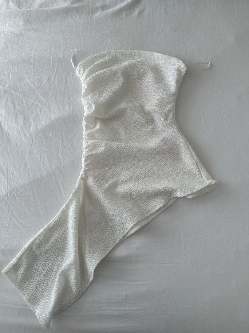 white zara asymmetrical tube top (Category: Sleeveless) located in Quezon City. Submitted by 49diam (Listing ID 1470953810, Image 1). Description: never used sf shouldered by buyer .