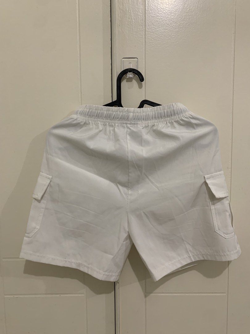 White Cargo Shorts with Black Drawstring Size M (Category: Shorts) located in Pasig City. Submitted by lovedbyri (Listing ID 1471009609, Image 3). Description: - Brand: Polo Ralph Lauren - Condition: Brand new, never worn, clean fabric - Size: M - Color: White with black drawstring waistband - Features: Side pockets and embroidered horse logo on left leg pocket - Style: Casual, perfect for hot weather.