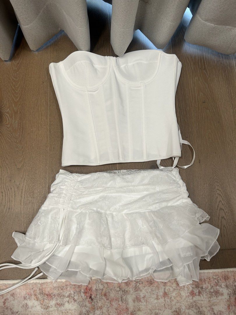 White corset & Skirt (Category: Sets or Coordinates) located in Manila. Submitted by iloveclothesnmakeup444 (Listing ID 1471009970, Image 1). Description: No damages/stains Top: Size S best fits waist 25-27 Skirt: Size S best fits waist 25-27 Can buy individually Corset: 450 SOLD Skirt: 250 Loc: Pasig.