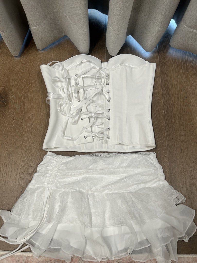 White corset & Skirt (Category: Sets or Coordinates) located in Manila. Submitted by iloveclothesnmakeup444 (Listing ID 1471009970, Image 2). Description: No damages/stains Top: Size S best fits waist 25-27 Skirt: Size S best fits waist 25-27 Can buy individually Corset: 450 SOLD Skirt: 250 Loc: Pasig.