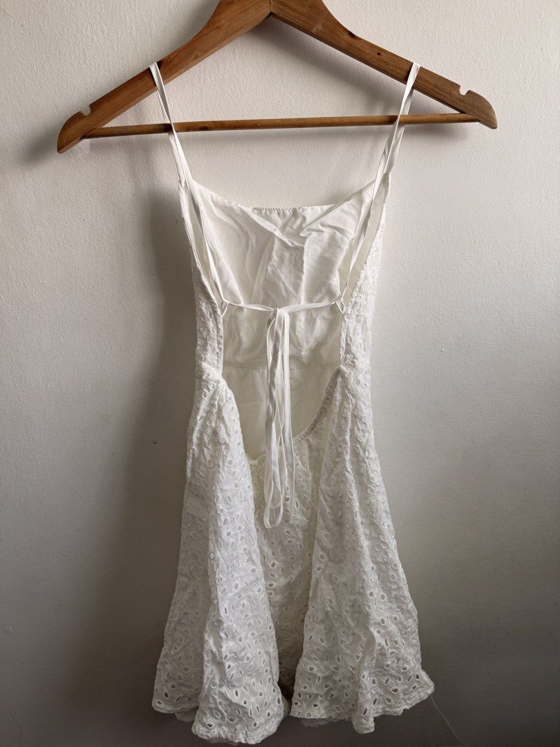White Eyelet Spaghetti Strap Mini Summer Dress with Tie Back (Category: Dresses) located in Caloocan City. Submitted by elle0001 (Listing ID 1470979414, Image 2). Description: - Adjustable straps - Fully lined interior fabric - Can fit XS-S only 📍NORTH CALOOCAN.