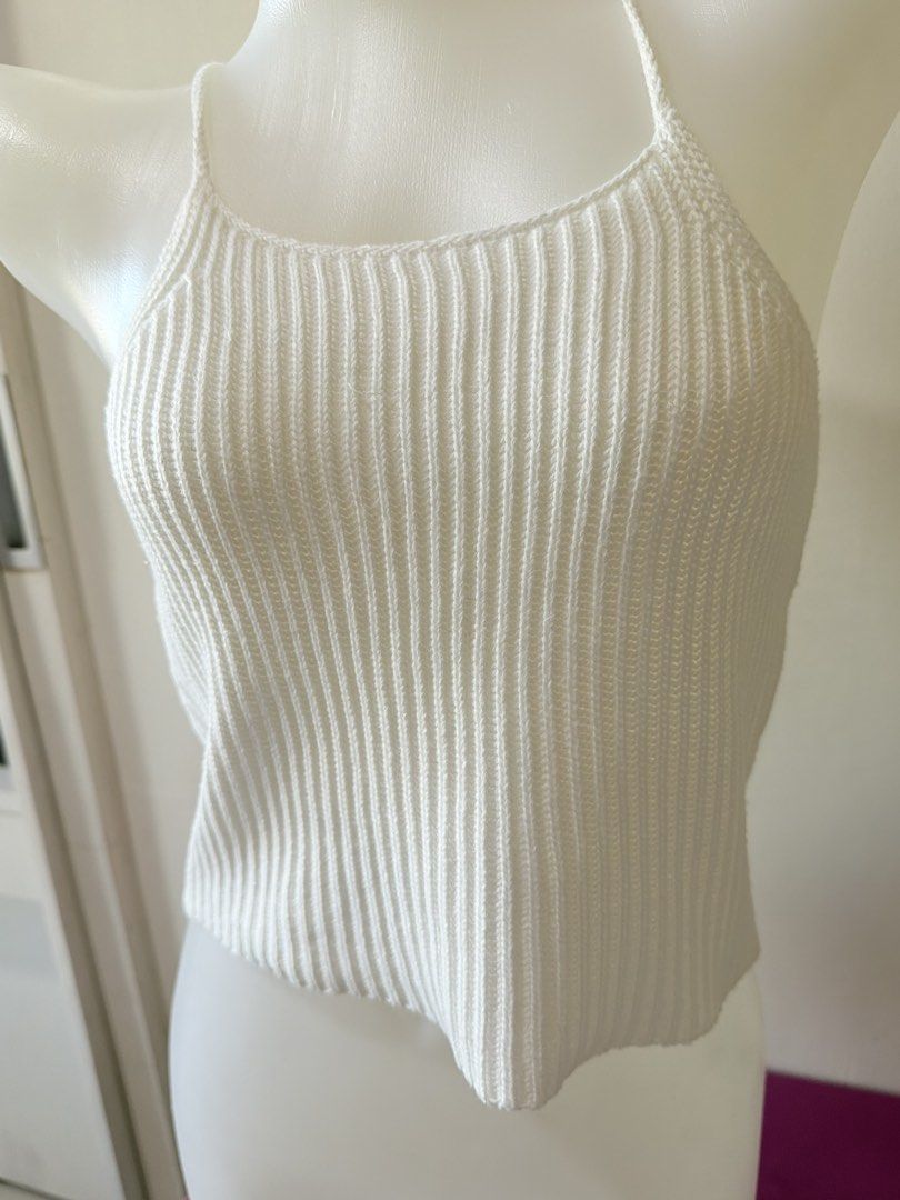 White knitted sleeveless (Category: Sleeveless) located in Manila. Submitted by hellokittyjhoe (Listing ID 1470956104, Image 1). Description: .