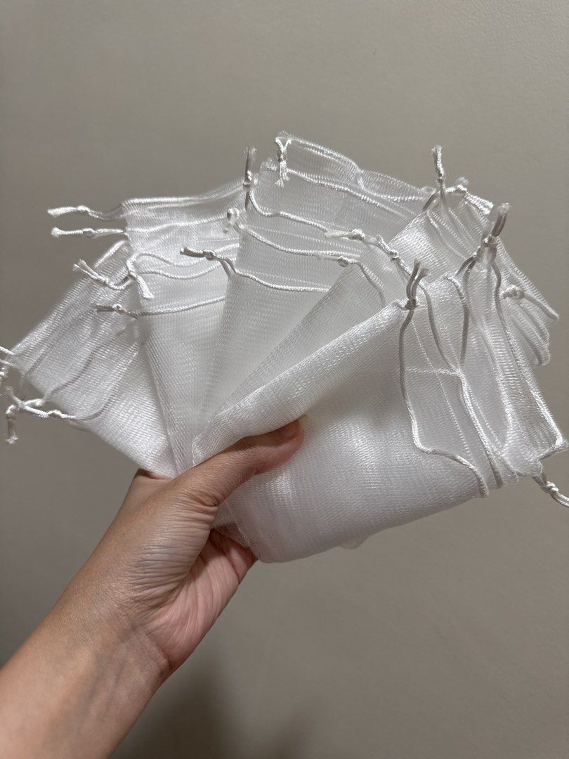 White Mesh Drawstring Pouches for soap (Category: Bath) located in Bacoor. Submitted by decluterwithellie8 (Listing ID 1471066071, Image 1). Description: Soap mesh net 25 pcs .