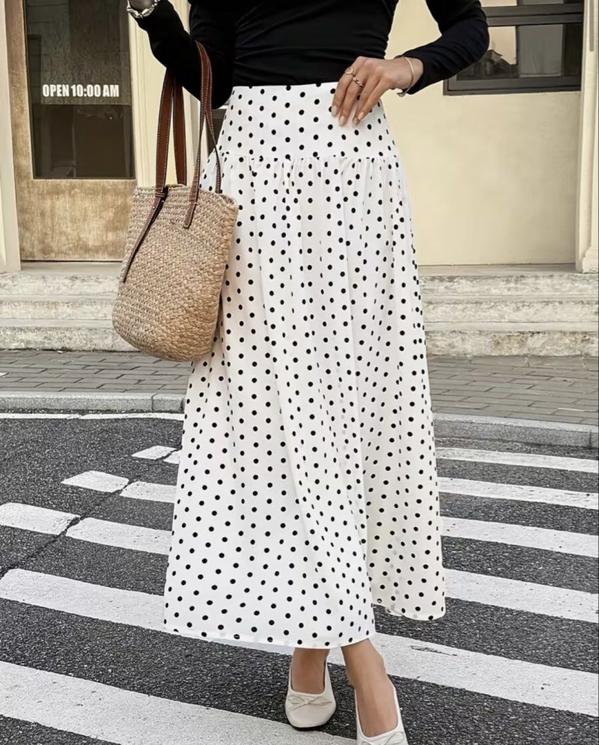 White Polka Dot Long Skirt (Category: Skirts) located in Caloocan City. Submitted by declutterieee (Listing ID 1471015277, Image 1). Description: - Color & Pattern: White with classic black polka dots - Fit & Style: High-waisted yoke with a gathered, flared shape and midi length - Material: Lightweight and flowy for comfortable all-day wear - Perfect for: Casual day outs, easily styled with basic tops and flats - Condition: Excellent - Size large