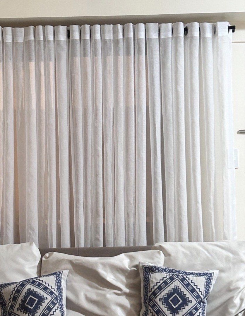 White sheer curtains window drapes with tab top (Category: Curtains & Blinds) located in Taguig. Submitted by tidytitan (Listing ID 1471040399, Image 1). Description: - Color: White sheer - Header: Tab top style - Hanging: Fits on a black rod - Features: Lightweight fabric that lets natural light filter through nicely - Size: Standard length for regular living room windows - Condition: Great clean look, selling due to upcoming move.