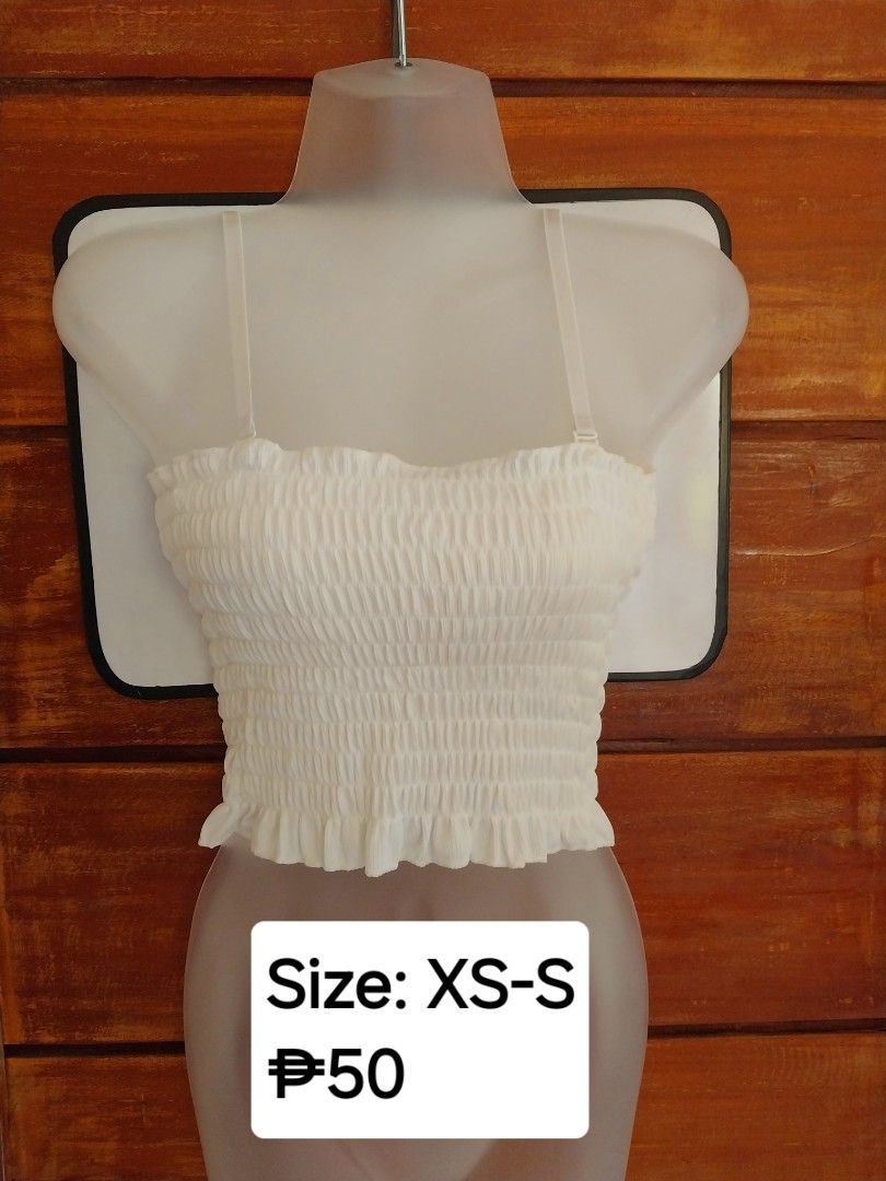 White Smocked Crop Top with Adjustable Straps (Category: Sleeveless) located in Binangonan. Submitted by verystrawberryyyyy (Listing ID 1471005392, Image 1). Description: REMINDERS: • Colors may vary slightly due to lighting. • Please check photo for the item's condition, price, and size. • DM me for more details or inquiries! Thank you! ✨️.