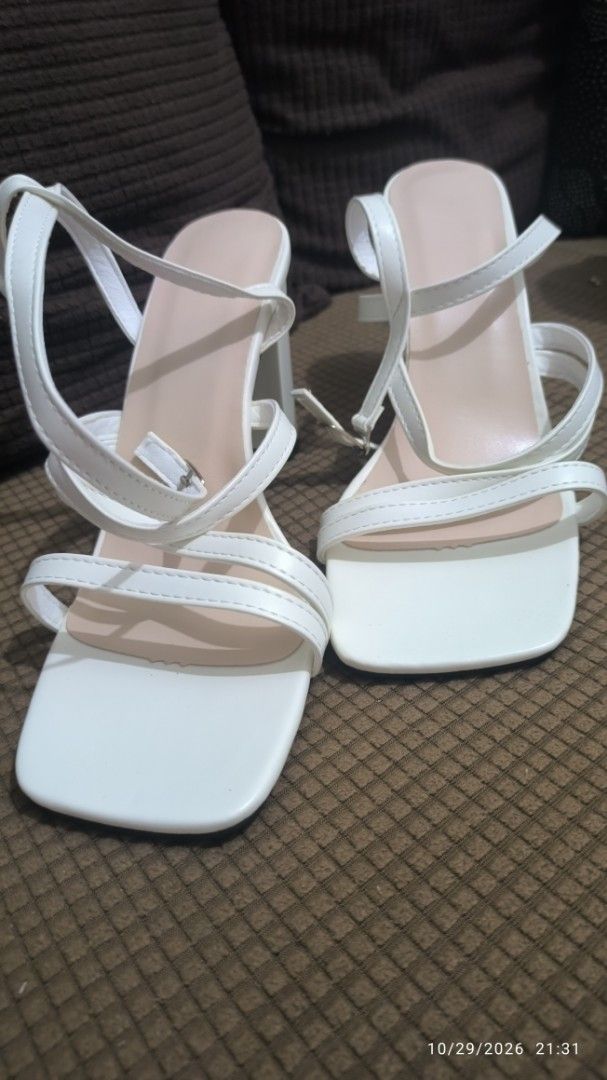 White Square Toe Strappy Block Heel Sandals (Category: Heels) located in Manila. Submitted by ljane_459 (Listing ID 1471069326, Image 2). Description: - Original price: 358 - Color: White with nude inner sole - Heel: Comfortable chunky block heel - Toe: Modern square open toe - Design: Multiple thin straps with secure ankle buckle closure - Style: Super trendy, versatile for dressing up or down - Mode of Payment: GCash or BDO - Shipping: Same-day