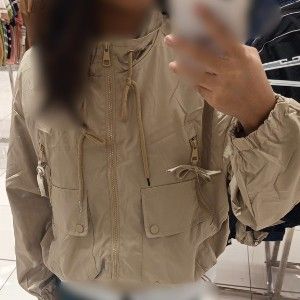 women's windbreaker jacket with cargo pockets & drawstring hem (Category: Coats, Jackets and Outerwear) located in Manila. Submitted by eli.archive (Listing ID 1471072200, Image 3). Description: bought from landmark color: beige/ khaki/ light tan fit: slightly boxy cropped fit material: nylon or polyester blend (windbreaker fabric) my measurements for reference: h - 150cm w - 45kg.