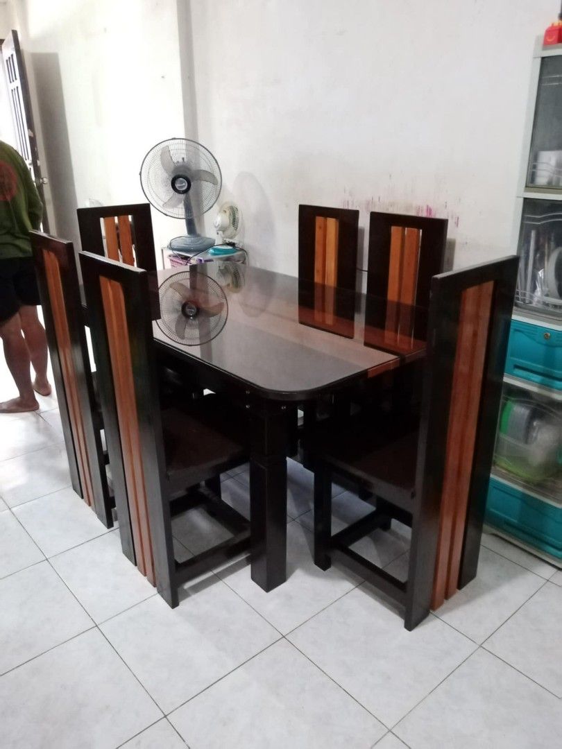 Wooden Dining Table with Six Chairs (Category: Tables & Sets) located in Malasiqui. Submitted by joeyascrat00982 (Listing ID 1471001064, Image 3). Description: For sale Dining set Pure mahogany wood free topglass Free delivery at cod 4seaters 13k 6seaters 16k 8seaters 20k .