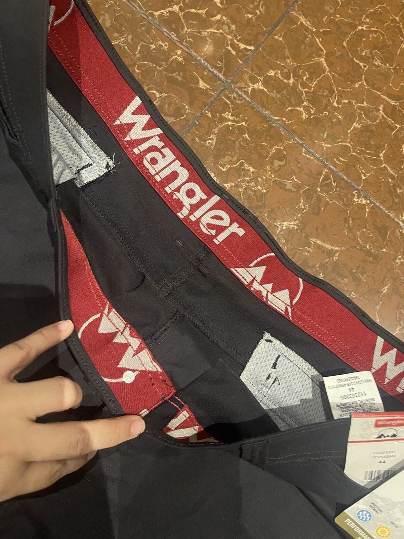 Wrangler Performance Zip Cargo Pants Relaxed Fit (Category: Jeans) located in Paranaque City. Submitted by claire.bam (Listing ID 1471116841, Image 2). Description: - Brand: Wrangler - Style: Performance Zip Cargo Pants - Fit: Relaxed - Features: Moisture-wicking, UPF 50 sun protection, Flex for comfort - Pockets: Secure zip cargo pockets - Condition: Brand new with tags - Ideal for: Outdoor activities, casual wear.