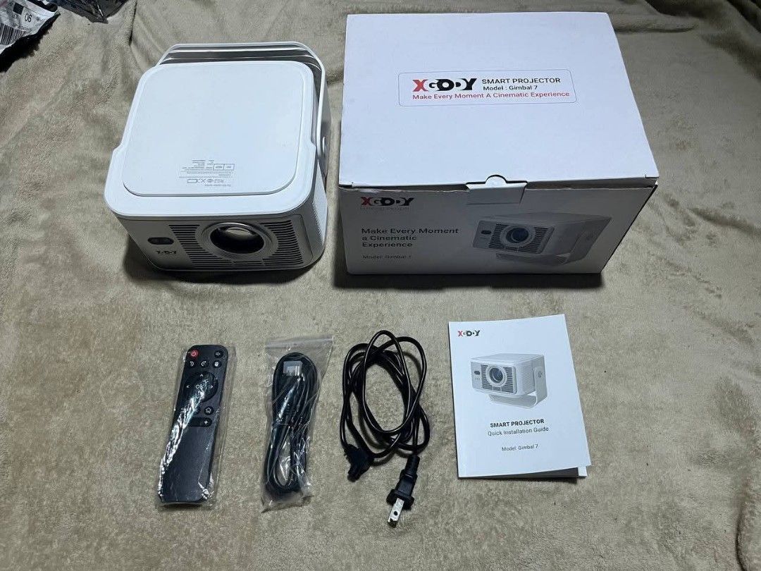 XGODY GIMBAL 7 4K HD (Category: Projectors) located in Quezon City. Submitted by jcrafty.co (Listing ID 1471051814, Image 1). Description: FOR SALE XGODY GIMBAL 7 7000 ONLY NEGOTIABLE!! BRAND NEW Optical & Projection Specs Native Resolution: 1080p Full HD (1920 x 1080) Supported Resolution: Up to 4K/8K decoding at 60fps Brightness: 900 to 1300 ANSI Lumens (varies slightly by market configuration) Contrast Ratio: 2000:1 with HDR10, HDR10+, and HLG