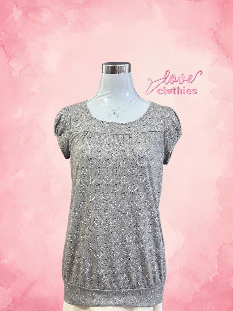 Xhilaration Gray Pattern Short Sleeve Blouse Medium (Category: Blouses) located in Tuguegarao City. Submitted by love_clothies (Listing ID 1471064114, Image 1). Description: - Brand: Xhilaration - Size: Medium - Color: Gray with intricate white pattern all over - Material: 64% polyester, 36% rayon - Features: Scoop neckline, gathered fabric detail, and fitted band hem - Condition: Excellent, tag attached - Perfect for daily casual wear or smart-c