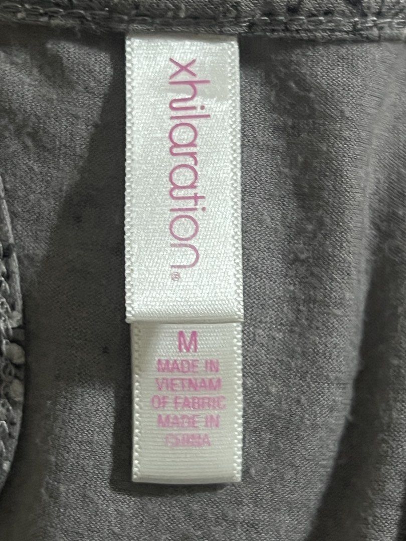 Xhilaration Gray Pattern Short Sleeve Blouse Medium (Category: Blouses) located in Tuguegarao City. Submitted by love_clothies (Listing ID 1471064114, Image 2). Description: - Brand: Xhilaration - Size: Medium - Color: Gray with intricate white pattern all over - Material: 64% polyester, 36% rayon - Features: Scoop neckline, gathered fabric detail, and fitted band hem - Condition: Excellent, tag attached - Perfect for daily casual wear or smart-c