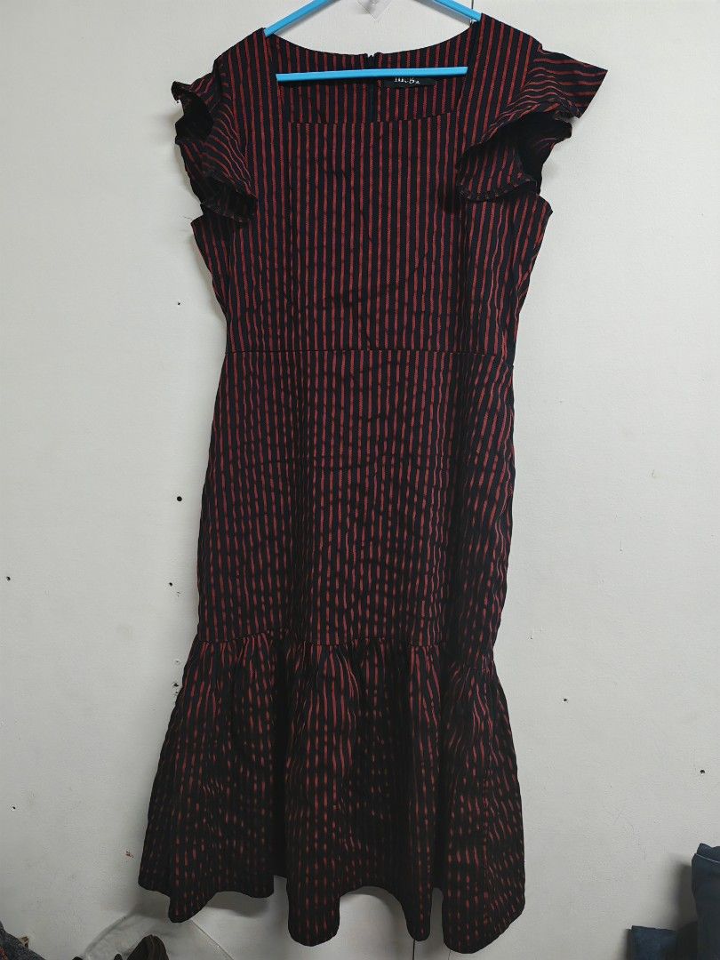 XL Meg Striped Ruffle dress (Category: Dresses) located in Pasig City. Submitted by she_declutters_ph (Listing ID 1470985252, Image 1). Description: Used 2x. Material is a bit stretchy. - Brand: Meg - Style: Midi dress with red vertical stripes - Size: XL - Details: Square neckline, short ruffle sleeves, fitted waist, and slightly flared hem - Closure: Back zipper - Fabric: Lightweight and comfortable - Occasion: Great for casual outings or dinne
