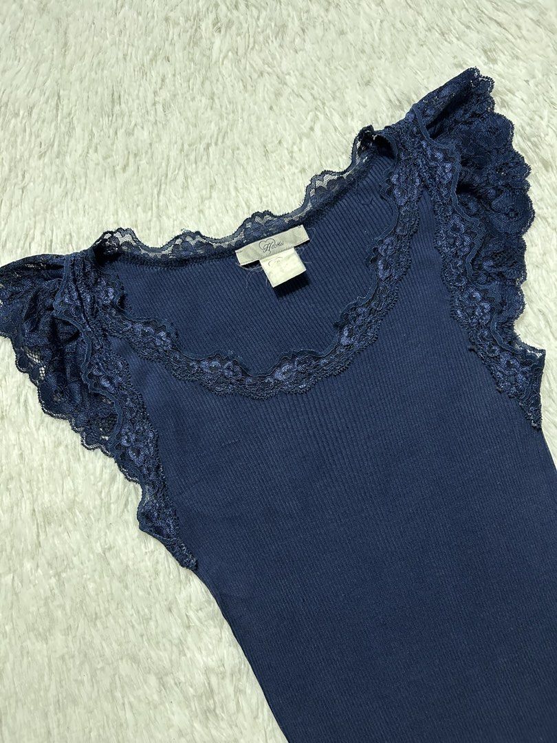 Y2k dark blue ribbed sleeveless top (Category: Others Tops) located in Quezon City. Submitted by herarchiveph (Listing ID 1470960383, Image 3). Description: Hemei Y2k dark blue ribbed sleeveless top Width: 17 inches (stretchable) Length: 24.5 inches - sign of used.