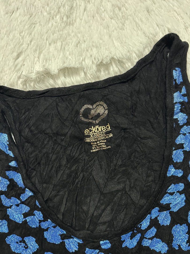 Y2k Eckōred fitted sleeveless top (Category: Sleeveless) located in Quezon City. Submitted by herarchiveph (Listing ID 1470964241, Image 3). Description: Y2k Eckōred fitted sleeveless top Xs on tag Width: 28 inches Length: 23 inches No major issue. Sign of use only.