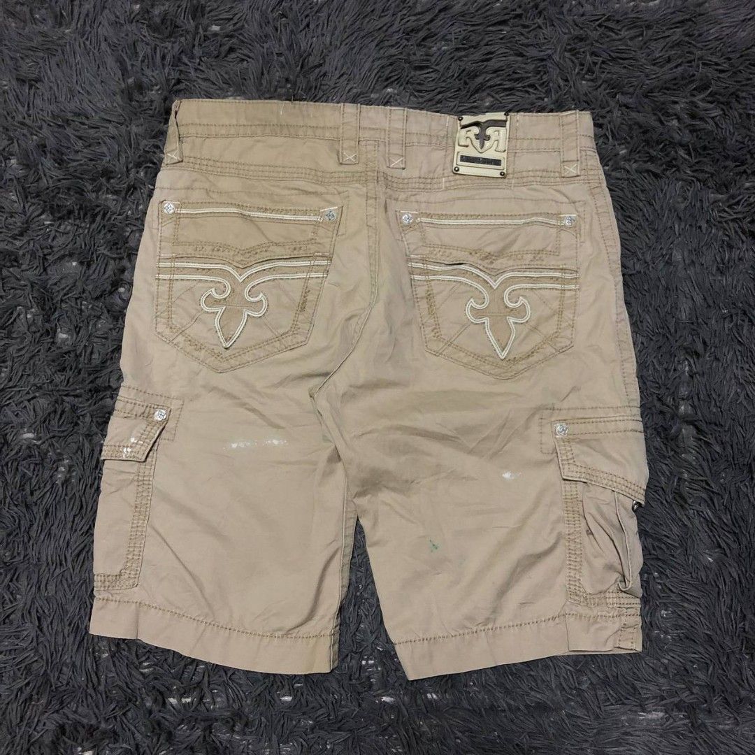 Y2k Rock Revival Cargo Short (Category: Shorts) located in Camiling. Submitted by thriftscape2024 (Listing ID 1470983042, Image 1). Description: Excellent Condition Color rate: 9/10 Issue: paint stain W: 38 L: 36 Thigh: 14 Leg Opening: 11.