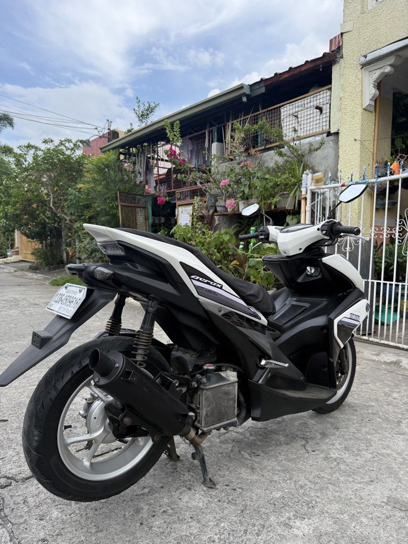 Yamaha Aerox 155 Motorcycle (Category: Motorbikes for Sale) located in Bacoor. Submitted by bernardjustine (Listing ID 1470936547, Image 3). Description: FOR SALE Yamaha Aerox S V1 2019 Model Abs keyless 31k orig odo All stock engine Complete orig OR/CR 1st owner open dos Id with 3 signatures 2 original remote keys with code Thick tires 90% front and rear No dragging No usok No tagas TRC pipe Issue: scratches, unregistered Asking price: 62,000 ne