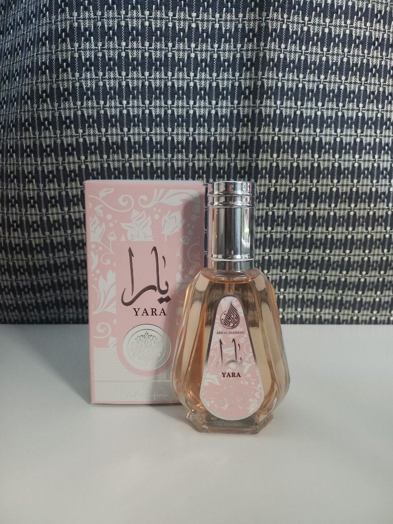 Yara Eau de Parfum (Category: Fragrance & Deodorants) located in Manila. Submitted by ejgafer (Listing ID 1471076307, Image 1). Description: - Brand: Ard Al Zaafaran - Size: 50ml - Packaging: Includes original pink floral box with a silver metallic sprayer cap.