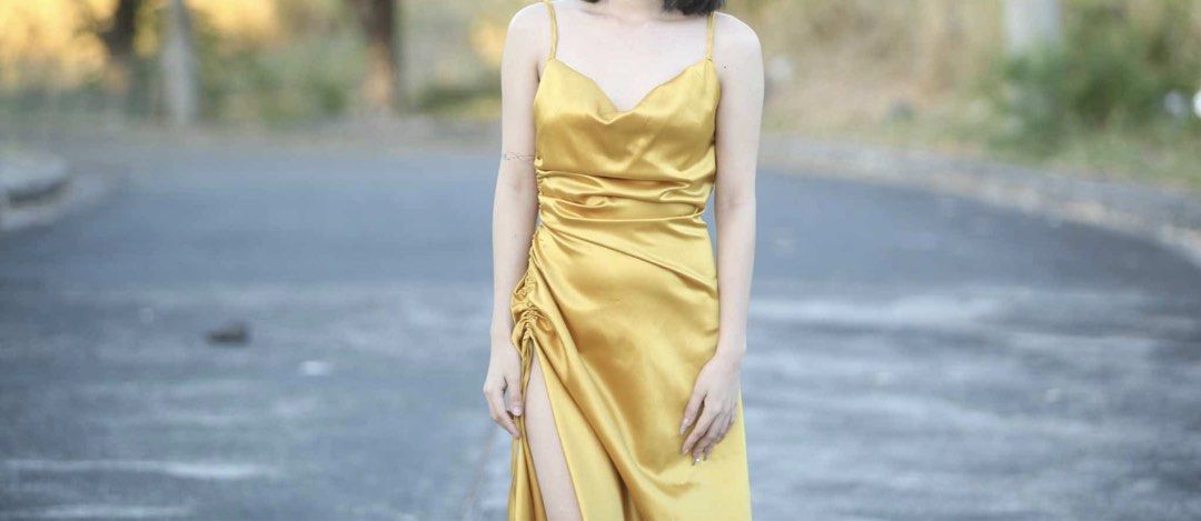 yellow gold satin dress (Category: Dresses) located in Rizal. Submitted by sheshells.gem (Listing ID 1470939616, Image 1). Description: size: small color: yellow gold material: smooth / glossy / satin condition: worn once for a few hours (pictorial) / properly stored like new best for formal events, dinners parties and dates silk spaghetti-strap slip dress with a cowl neckline and a high side slit..