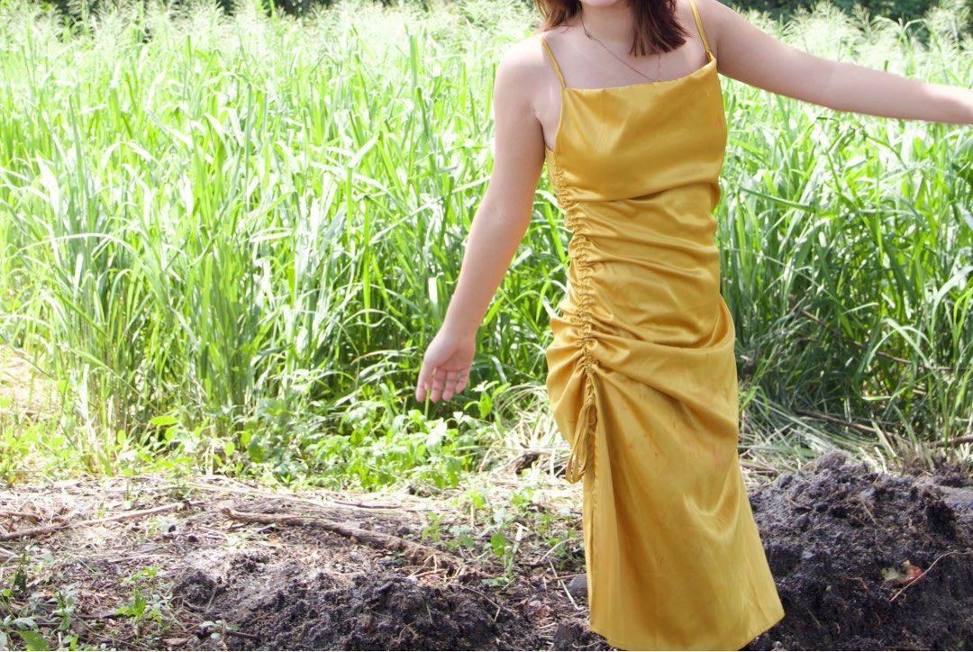 yellow gold satin dress (Category: Dresses) located in Rizal. Submitted by sheshells.gem (Listing ID 1470939616, Image 2). Description: size: small color: yellow gold material: smooth / glossy / satin condition: worn once for a few hours (pictorial) / properly stored like new best for formal events, dinners parties and dates silk spaghetti-strap slip dress with a cowl neckline and a high side slit..