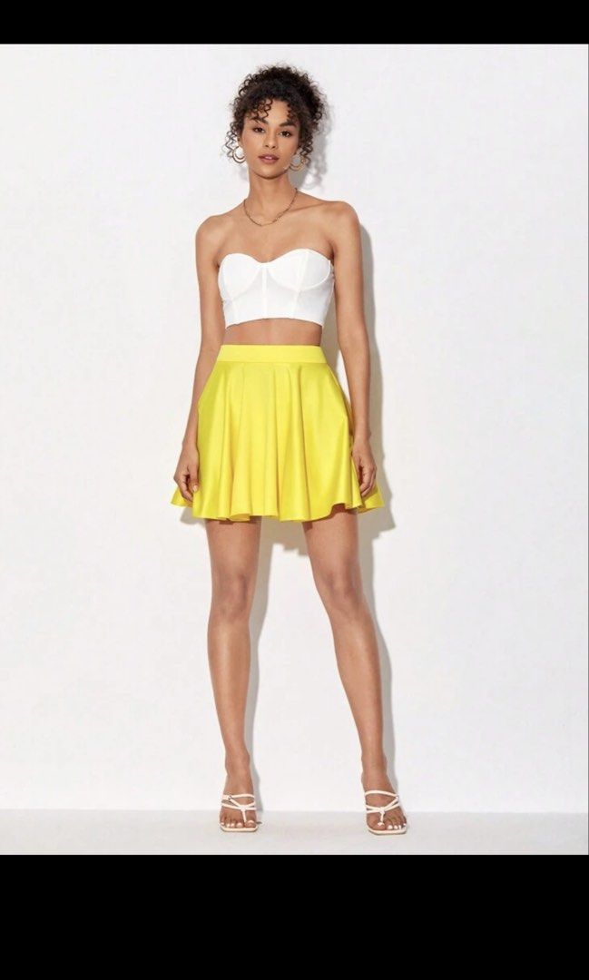 SHEIN Yellow Solid Flare Skater Skirt (Category: Skirts) located in Manila. Submitted by prelovedbychellyy (Listing ID 1470936351, Image 1). Description: Bought this for 650+ USED ONCE during my disneyland trip - Color: Bright yellow - Style: High waist, solid color, flare hem - Versatile Use: Great for workouts, music festivals, or casual everyday wear - Easy Styling: Looks amazing paired with crop tops or basic tees - Mode of Payment: GCash, BP