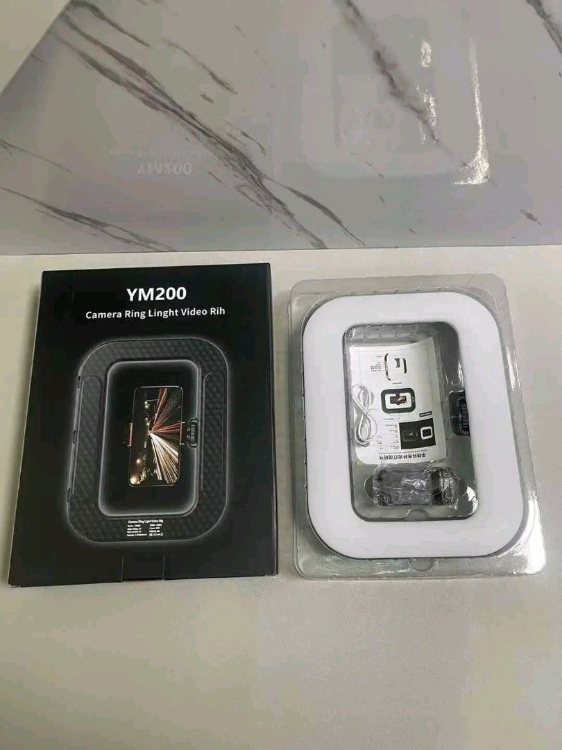 YM200 Handheld Rechargeable (8000mah)Ring Light (Category: Lighting & Studio Equipment) located in Manila. Submitted by ramosmarvi53163 (Listing ID 1471000004, Image 1). Description: YM200 Handheld Rechargeable (8000mah)Ring Light.