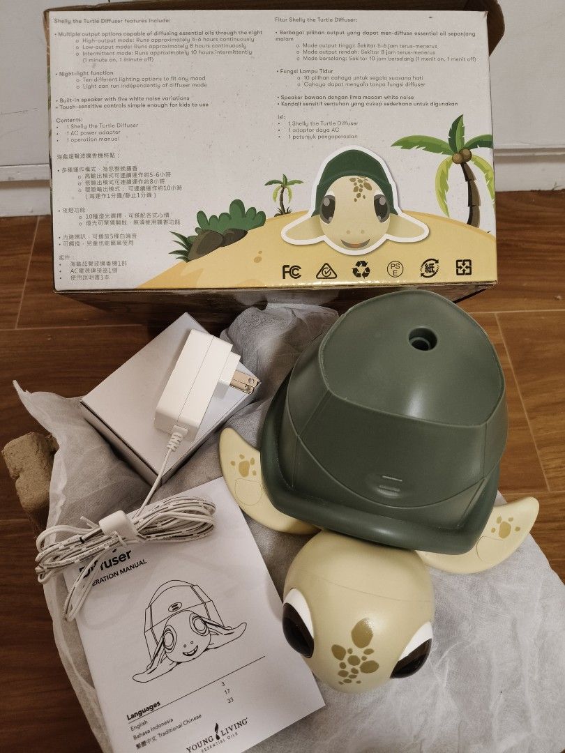 Young Living Shelly the Turtle Kids Ultrasonic Diffuser (Category: Home Fragrance) located in Manila. Submitted by eatsca_ (Listing ID 1470943841, Image 3). Description: - Brand: Young Living - Item: Kids Ultrasonic Diffuser (Green Turtle design) - Condition: 9/10 Almost new, used few times only. - Includes: Original box, AC power adapter, and operation manual - Features: Multiple mist output settings, 10 lighting options, and built-in white nois