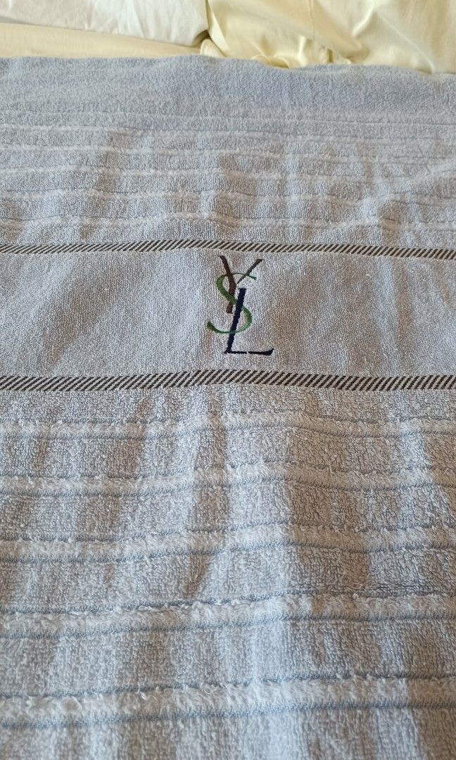 YSL Blue owel Blanket (Category: Bedding & Towels) located in Makati City. Submitted by jstreasuredfinds (Listing ID 1470989647, Image 2). Description: 140x190cm Washed and sanitized Flaws: towel pilings but still usable condition.