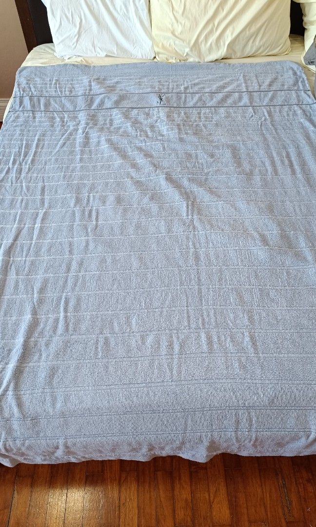 YSL Blue owel Blanket (Category: Bedding & Towels) located in Makati City. Submitted by jstreasuredfinds (Listing ID 1470989647, Image 3). Description: 140x190cm Washed and sanitized Flaws: towel pilings but still usable condition.
