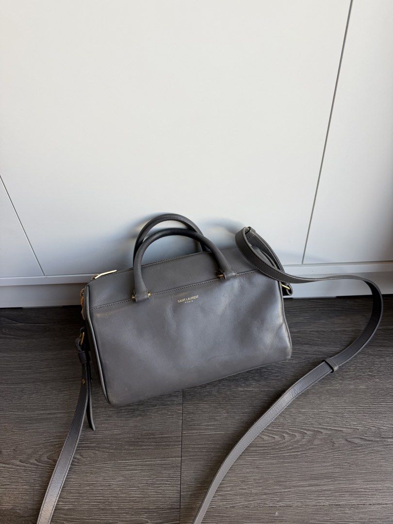 YSL DUFFLE WITH CARD GRAY (Category: Luxury Bags & Wallets) located in Makati City. Submitted by moiobsession (Listing ID 1470954962, Image 1). Description: authentic with authenticity card small size .