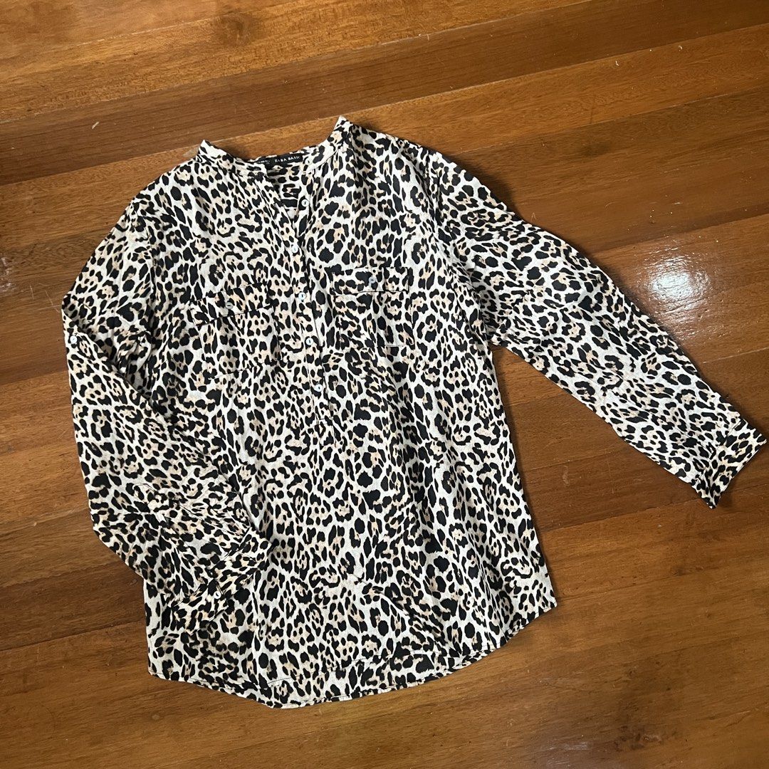 Zara basic long sleeve button top leopard print (Category: Longsleeves) located in Cebu City. Submitted by mariascart (Listing ID 1470946449, Image 1). Description: Pristine condition Very soft cloth Comfy to wear .
