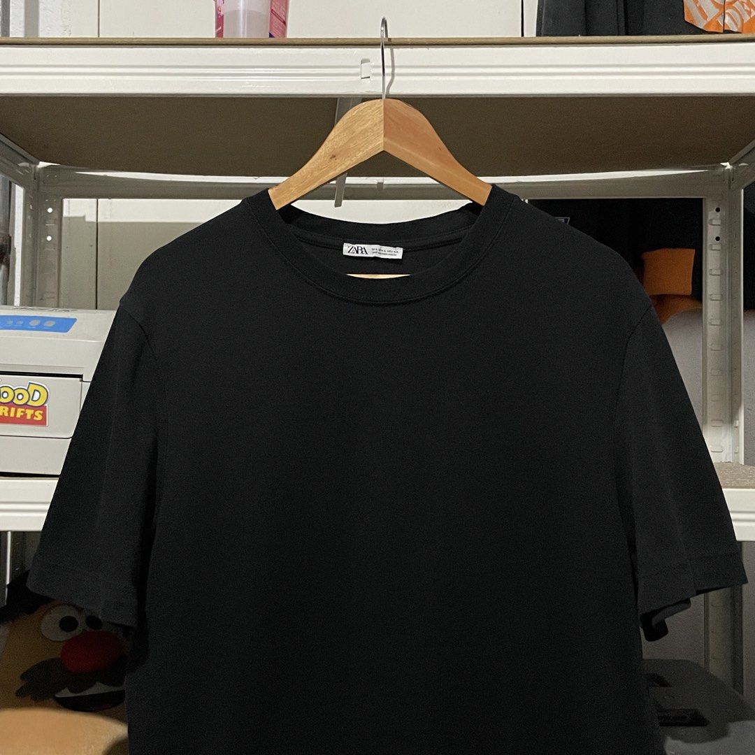 Zara Black Basic T-shirt Size L 20 x 28 (Category: Tshirts & Polo Shirts ) located in Porac. Submitted by good.thriftsph (Listing ID 1471094623, Image 3). Description: - Brand: Zara - Color: Plain Black - Size: Large (Relaxed fit) - Design: Classic crewneck, short sleeves - Condition: Good overall, worn a couple of times - Style: Versatile everyday basic that goes with anything.